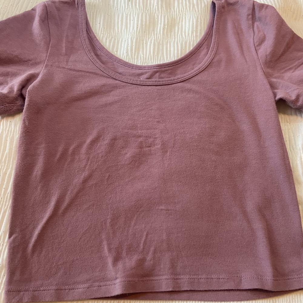 Purple crop top, size small. Tight fitting